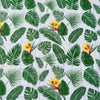White tablecloth with Delicious Monster and Strelitzia floral print on dining table