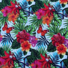 White tablecloth with tropical flower design on dining table