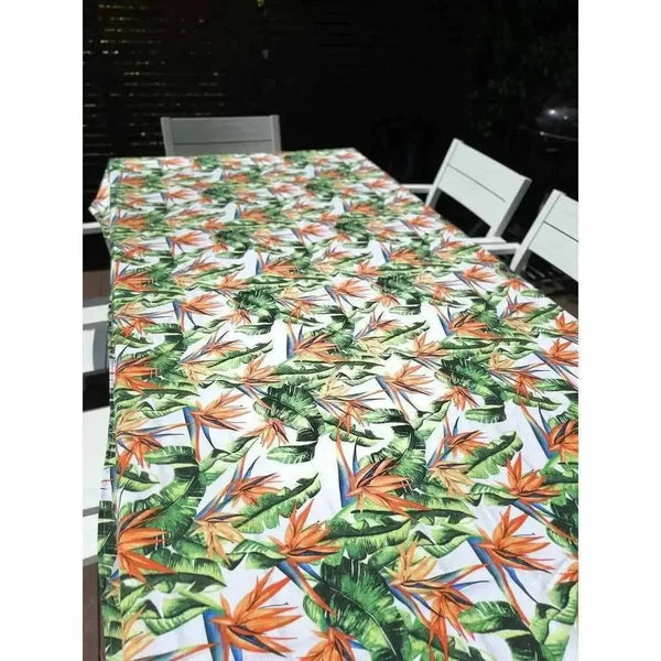 White tablecloth with watercolor strelitzia design for elegant dining