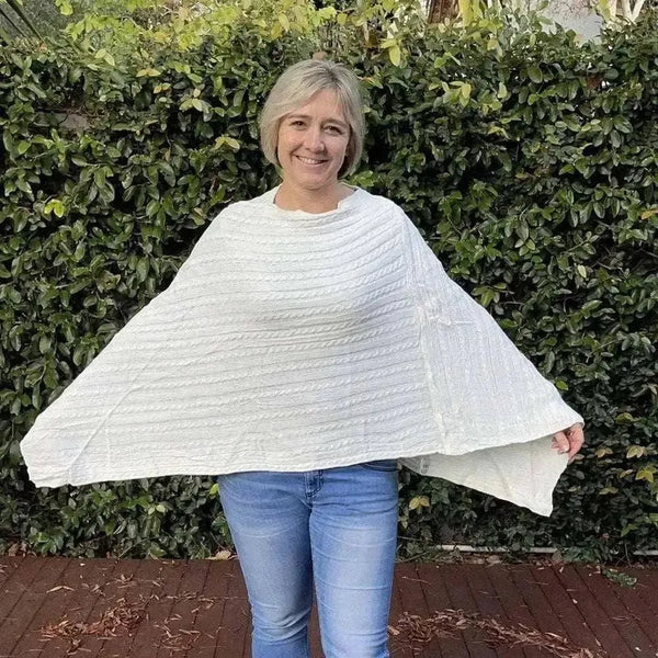 Cream knitted winter poncho with round neck from Cotton Road