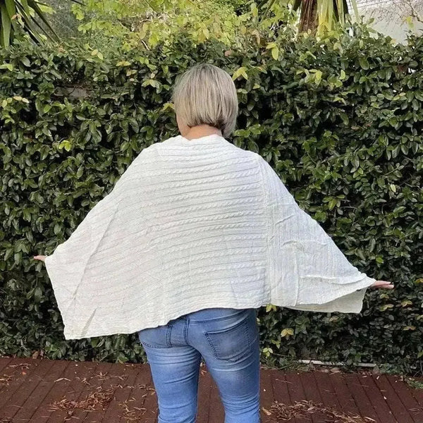 Cream knitted Winter Poncho with round neck by Cotton Road