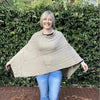 Light brown knitted winter poncho with round neck from Cotton Road