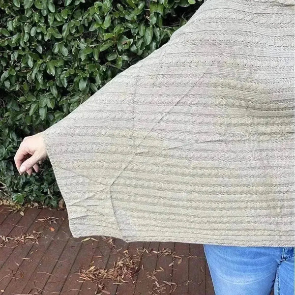 Light brown knitted winter poncho with round neck by Cotton Road