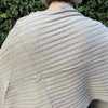 Light brown knitted winter poncho with round neck from Cotton Road