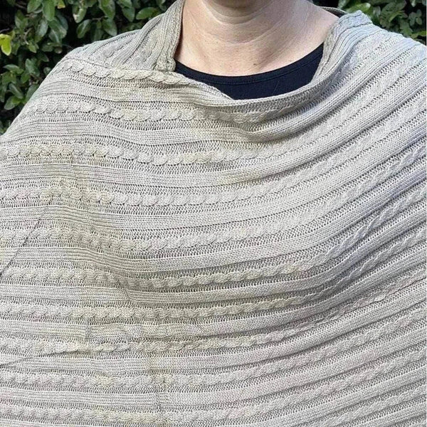 Light brown knitted winter poncho with round neck