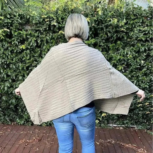 Light brown knitted winter poncho with round neck by Cotton Road