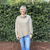 Light brown knitted winter poncho with round neck Cotton Road style
