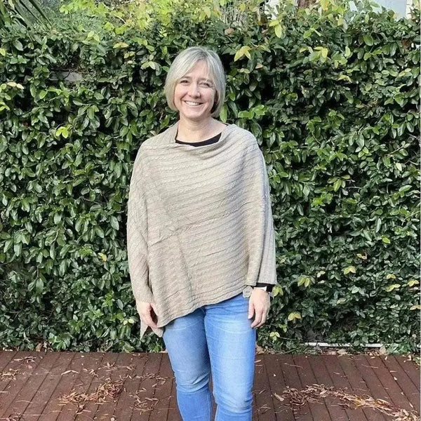 Light brown knitted winter poncho with round neck Cotton Road style