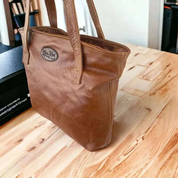 Woesmooi Genuine Leather Shopping Bag in light color, stylish and durable for everyday use