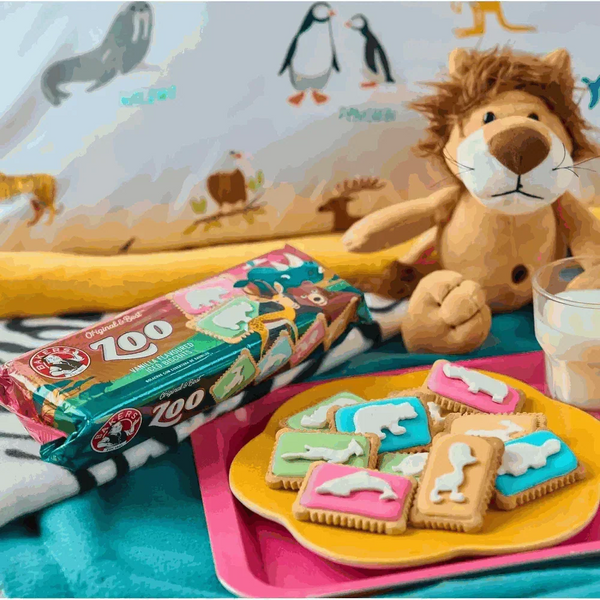 Bakers Iced Zoo Biscuits 150g with colorful iced animal shapes on vibrant backgrounds, perfect fun party treat