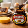 Marmite production process showing dark yeast extract spread in large stainless steel tanks