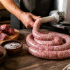 sausage making equipment including meat grinder and sausage stuffer in New Zealand setup