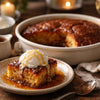 Malva pudding ingredients with syrup ready for baking