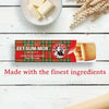 Bakers Eet-Sum-Mor 200G biscuits on a wooden surface with butter and wheat nearby.
