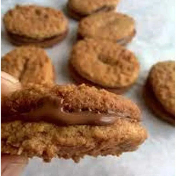 Bakers Chockits cookies filled with creamy chocolate, highlighting smooth texture.