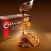 Bakers Chockits Original 200g pack with smooth chocolate being poured over cookies.