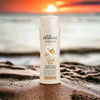 Oh So Heavenly Classic Care Soak It Up Body Lotion 375ml, ultra-nourishing hydration for dry skin, enriched with Shea, Cocoa, and Avocado Butters, vibrant sunset background.