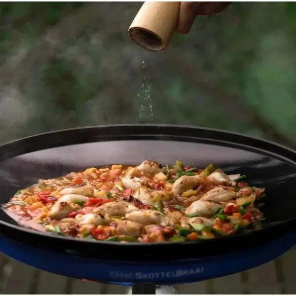 Portable CADAC Skottel Braai outdoor cooker compliant with NZ gas standards, featuring 46cm grill and lightweight design