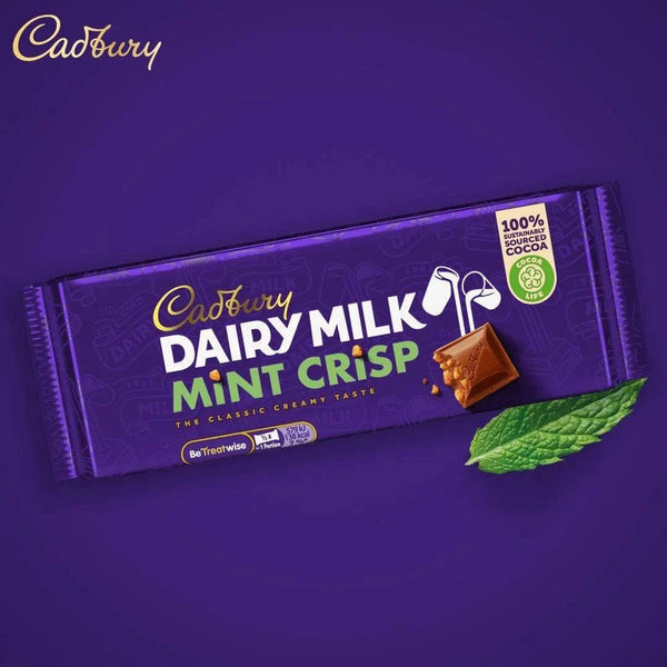 Cadbury Dairy Milk Mint Crisp Chocolate Slab 150g with mint leaves and packaging.