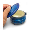 Blue enamel 3-legged cast iron pot with lid and handle, 0.7L capacity.