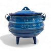 Traditional blue LK enamel cast iron pot with three legs, lid, and carrying handle, 0.7L capacity. Perfect for outdoor cooking and potjie dishes.