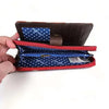 Red Cotton Road Large PVC Wallet with polka dots and zippered compartments