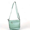 Cotton Road Sling Bag in green PU leather with weave effect and adjustable strap