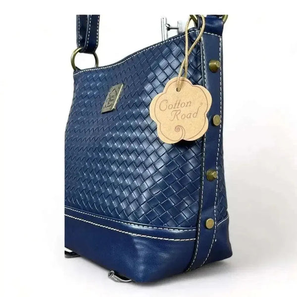 Cotton Road Sling Bag in navy PU leather with weave effect, adjustable strap, main zip compartment, and smaller zip pouches