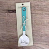 Enamel sugar spoon with wooden handle and farmhouse flower engraving