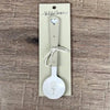 Enamel sugar spoon with wooden handle and laser engraved flower design