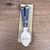 Enamel teaspoon set with wooden handles and farmhouse engraving