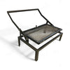 Flipbraai - Large mild steel portable grill with foldable legs and unique flip mechanism for even cooking outdoors.