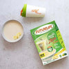 FutureLife Zero Banana 500g pack with a shake and bowl of banana smoothie on a countertop.