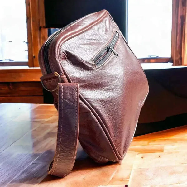 Dark genuine leather Woesmooi laptop bag with adjustable strap for laptops up to 15.6 inches