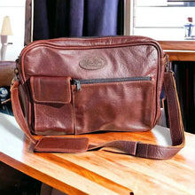 Dark genuine leather Woesmooi laptop bag with adjustable shoulder strap for laptops up to 15.6 inches