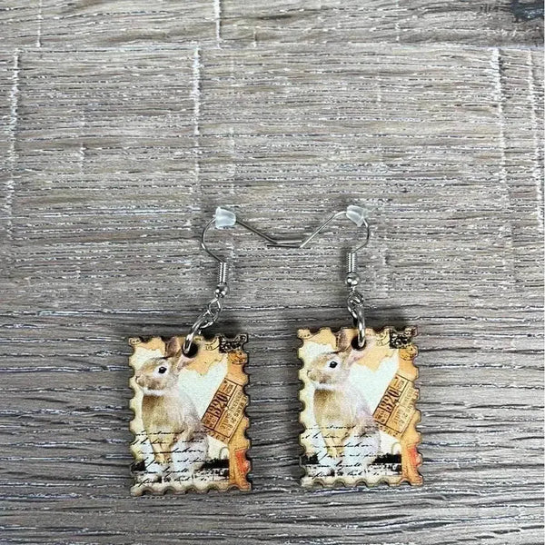Hanging earrings featuring postage stamp design with rabbit, nickel-free, sold in pairs, made in South Africa