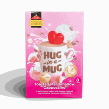 Box of Hug-in-a-Mug Toasted Marshmallow Cappuccino single-serve sticks with creamy coffee drink