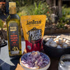 Jan Braai Classic Oxtail Potjie Sauce 400g pouch with mushrooms, chopped onions, and extra virgin olive oil bottle