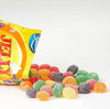 Bag of Beacon Jelly Tots spilling out colorful, sugar-coated gumdrop-like candies.
