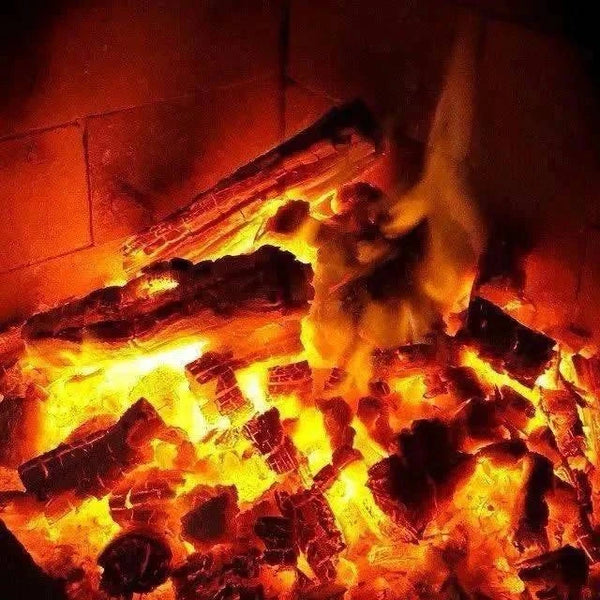 Kameeldoring Camel Thorn firewood burning brightly, providing efficient heat with low smoke and ash.