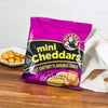 Bakers Mini Cheddars Fruit Chutney Multipack 33g Pack of 6 on a wooden surface.