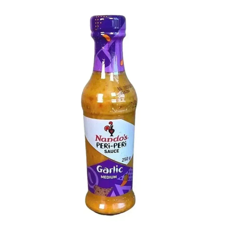 Nando's Peri-Peri Garlic Medium Sauce 250g bottle with African Bird's Eye Chilli and spices