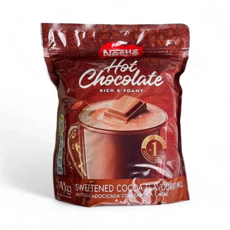 Nestle Hot Chocolate 1kg bag with rich and creamy flavor, perfect for indulgence.