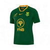 2025 Nike Springboks Home Stadium jersey in green and gold with embroidered Springbok and SA Rugby crest, Nike swoosh, and FNB sponsor logo, medium size.