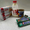Nestle Peppermint Crisp chocolate bars with baking ingredients on a countertop.