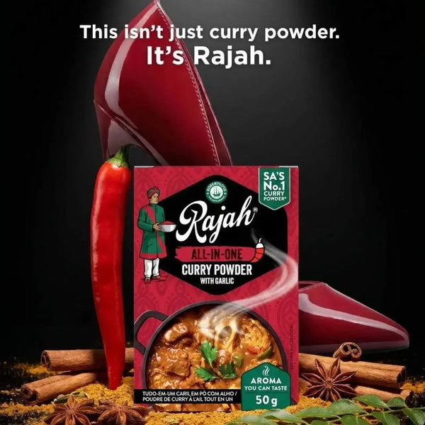 Rajah Curry Powder All in One 100g pack with natural blend of garlic, cumin, and cayenne spices for authentic Indian flavor