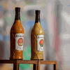 Rooibaard Original Peri Peri Sauce 550ml bottle, bold and spicy flavor.