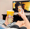 Rooibaard Spice 170ml seasoning bottle held while watching TV with popcorn.