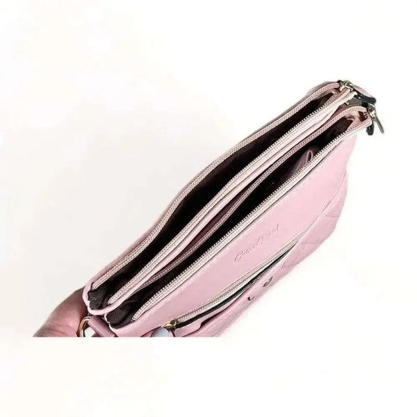 Pink PU leather sling bag with adjustable strap and lattice detailing