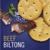 Bakers Pyotts Kips Biltong Flavoured Crackers - 200g packaging with crackers and beef biltong slices on a blue background.